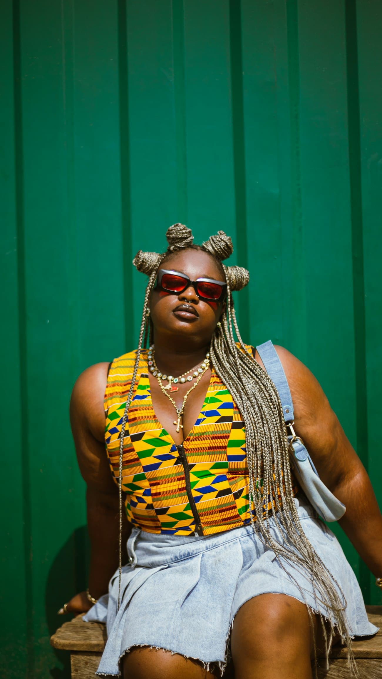A woman in a kente top