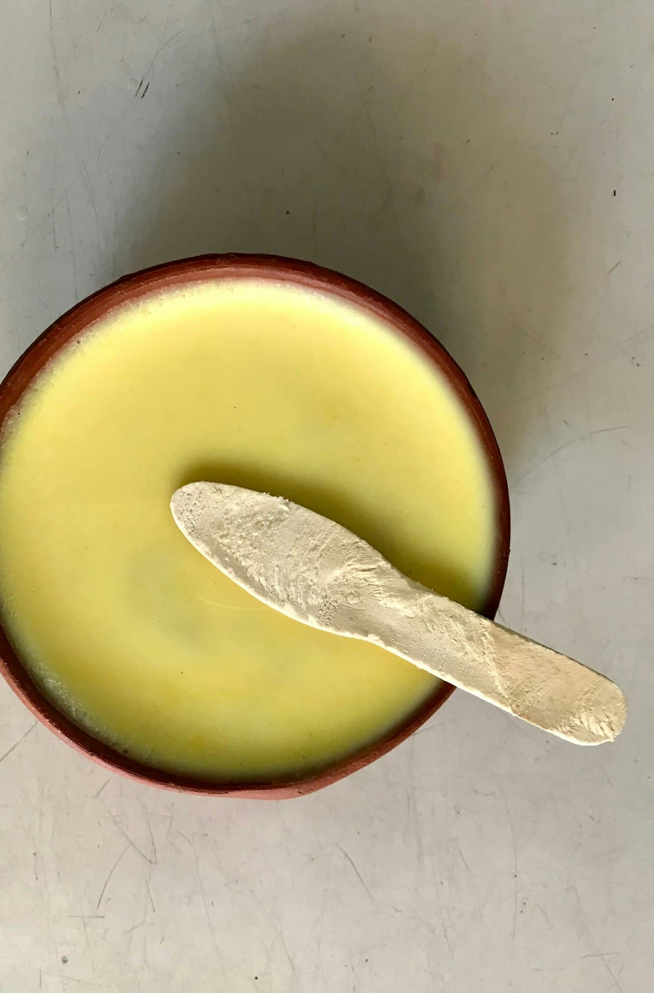 Raw shea butter in a bowl